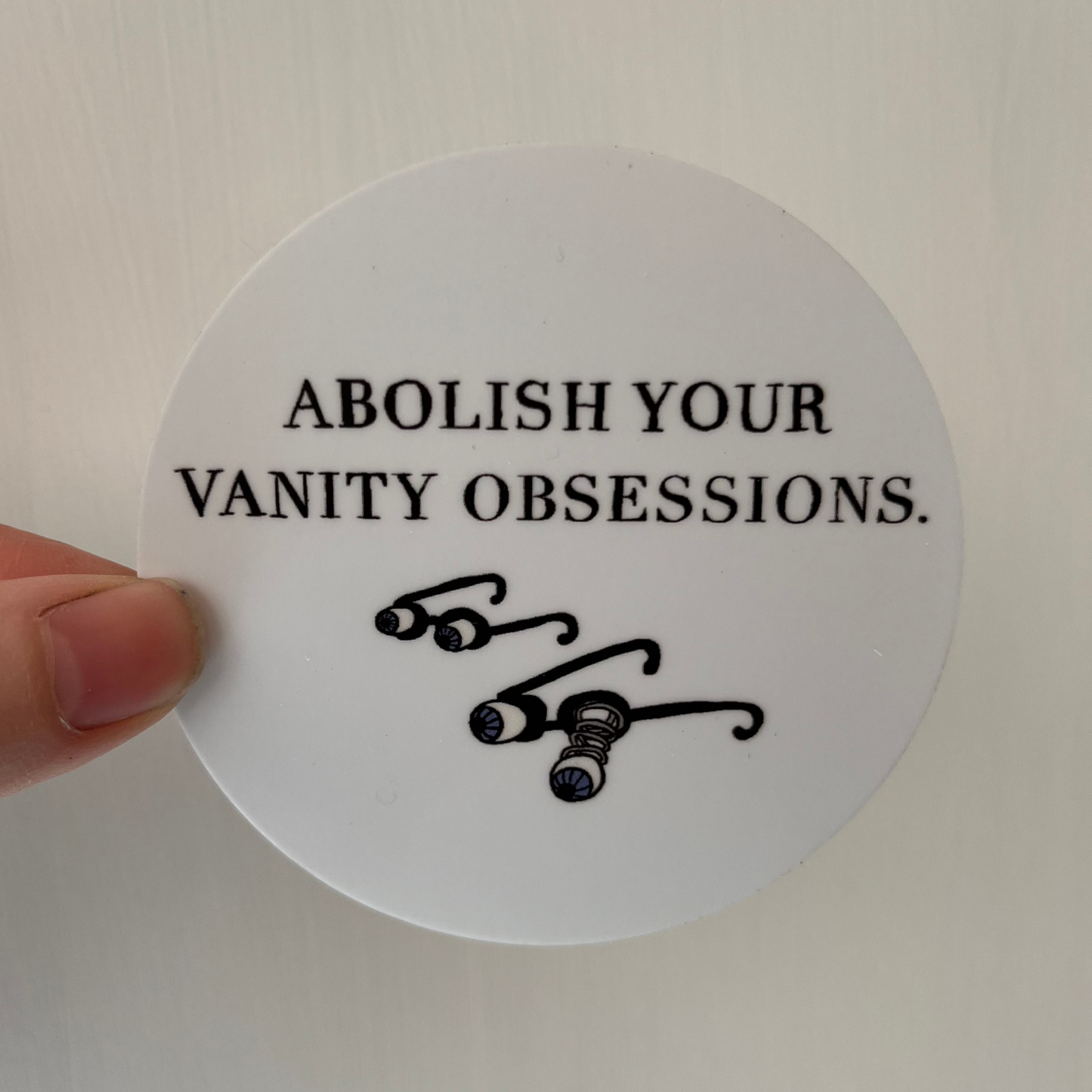 Abolish Your Vanity Obsessions Sticker